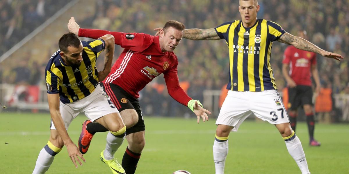 Wayne Rooney és Mehmet Topal. FOTÓ: Chris McGrath/Getty Images