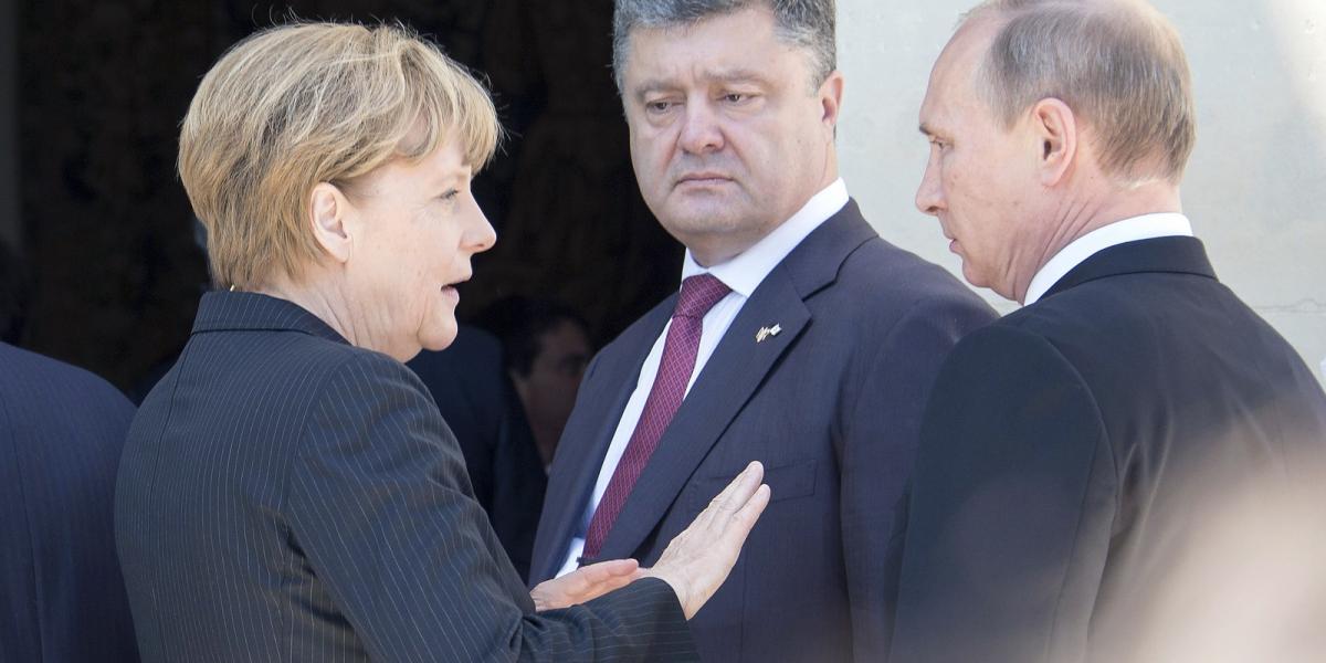 Angela Merkel német kancellár, Vlagyimir Putyin orosz elnök és Petro Porosenko megválasztott ukrán elnök Fotó: Getty Images