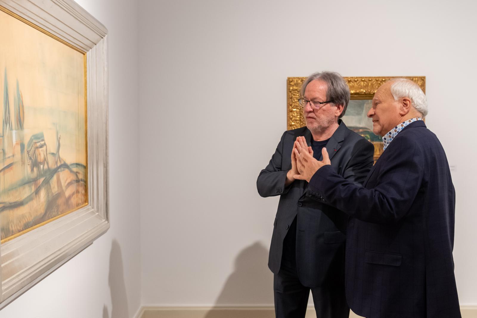 Baán László és Szabó András az egyik fő mű, a Délibábos, párás fények (1925) előtt