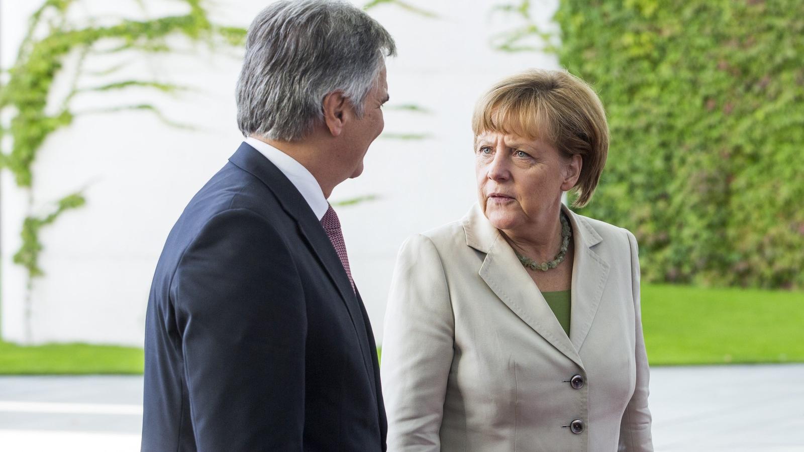 Werner Faymann orosz és Angela Merkel német kancellár egy korábbi találkozón. FOTÓ: Jochen Zick - Pool / Getty Images