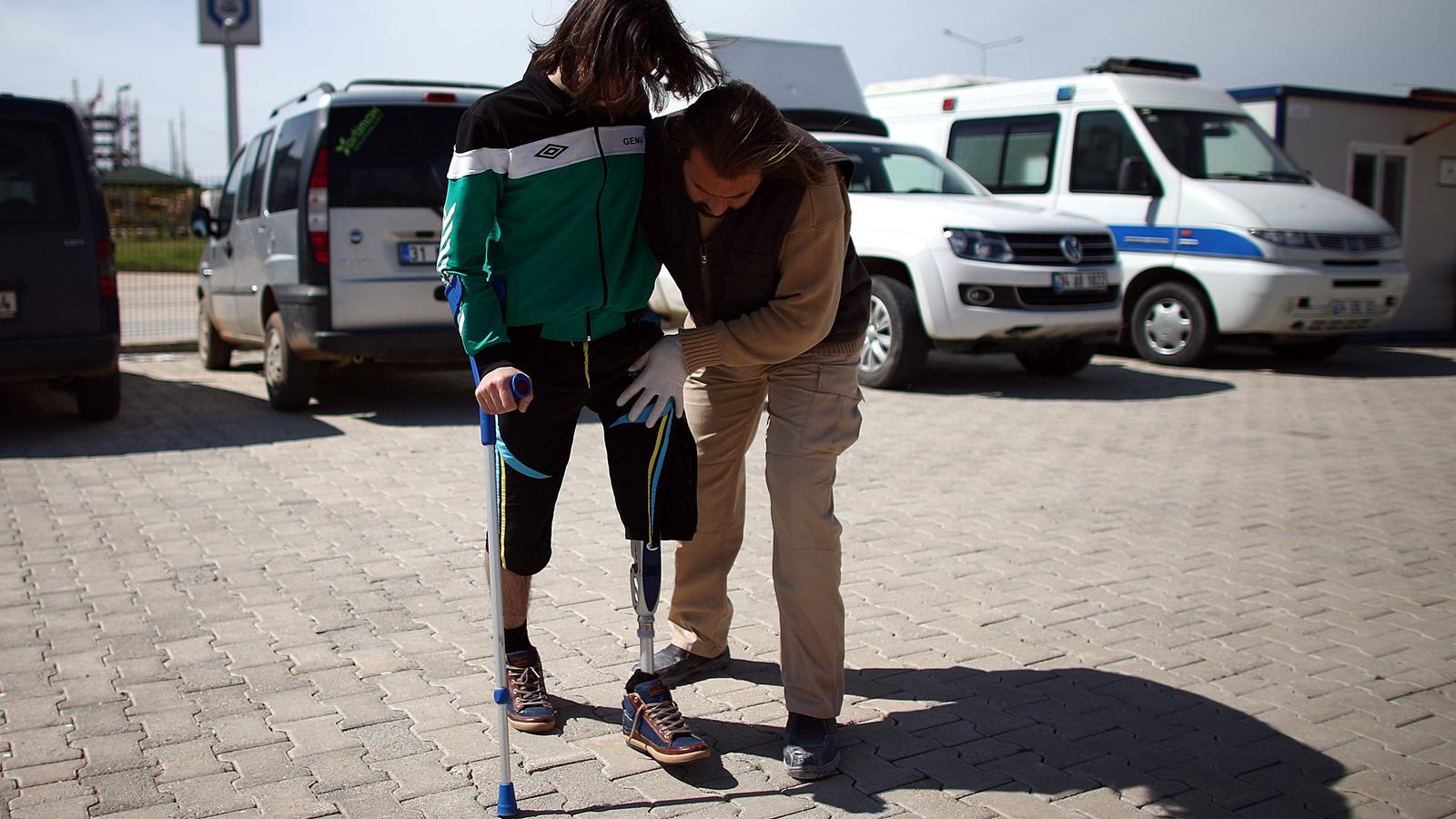 Sebesült szíriai menekült egy németországi táborban Fotó: Carl Court/Getty Images Hírek