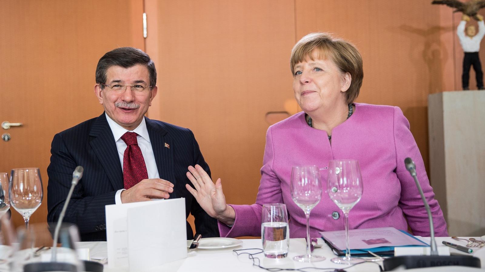 Angela Merkel, Ahmet Davutoglu Fotó: Getty Images