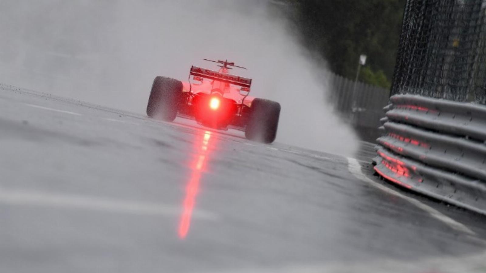 Vettel a vizes pályán. ANDREJ ISAKOVIC / AFP