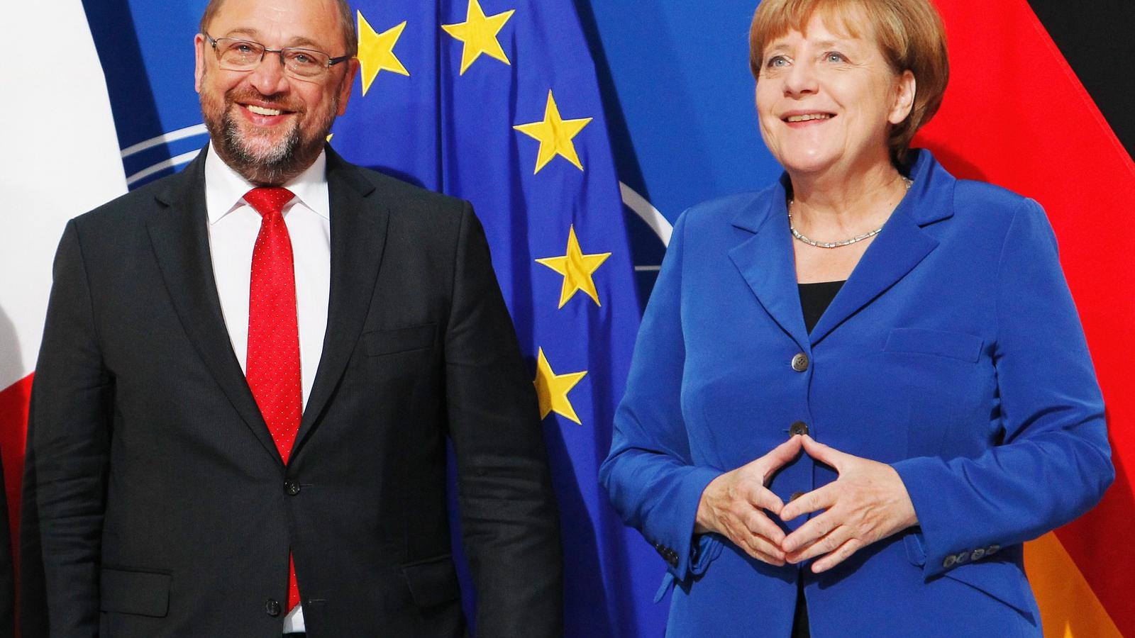 Merkel Schulz-szal FOTÓ: AFP