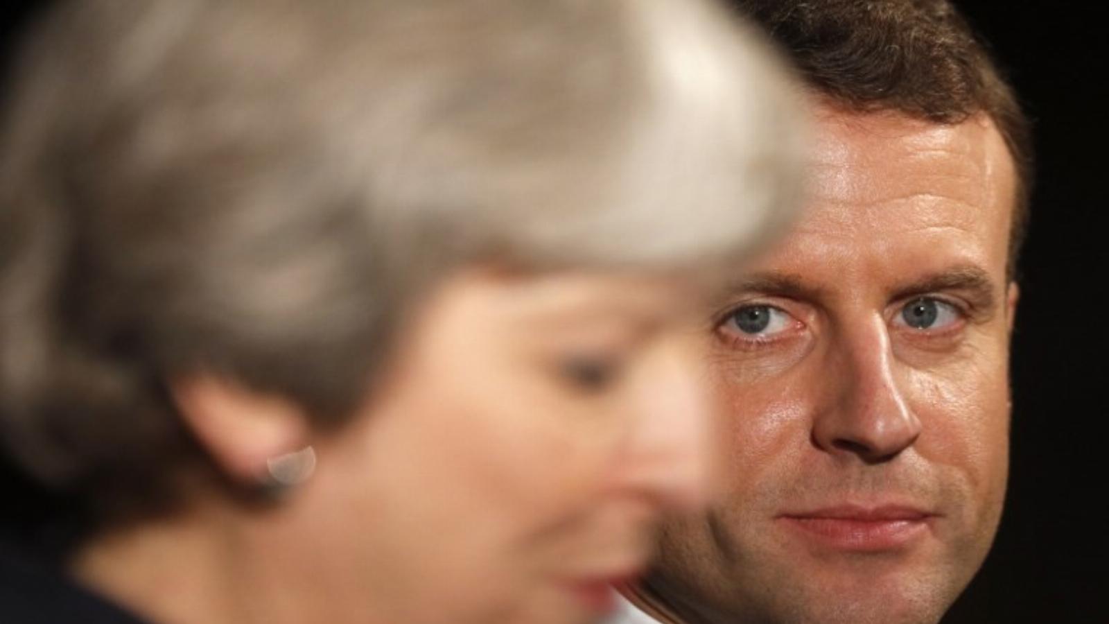 Theresa May és Ammanuel Macron. FOTÓ: ADRIAN DENNIS / AFP